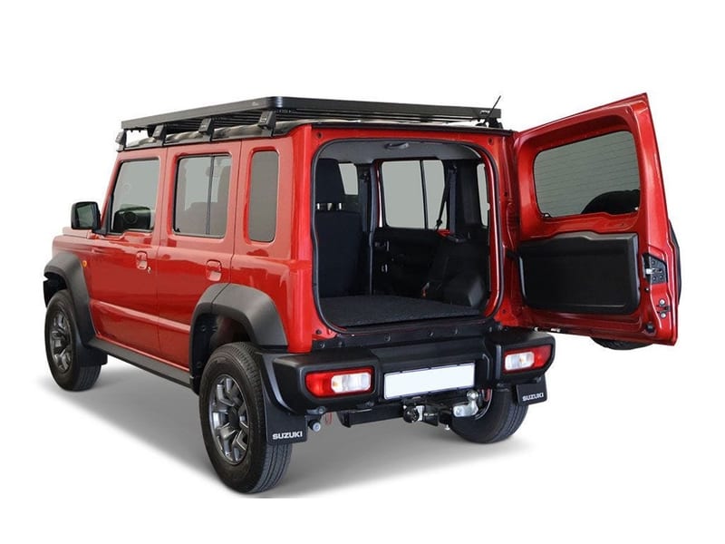 Base deck in the back of a red Jimny 5-door